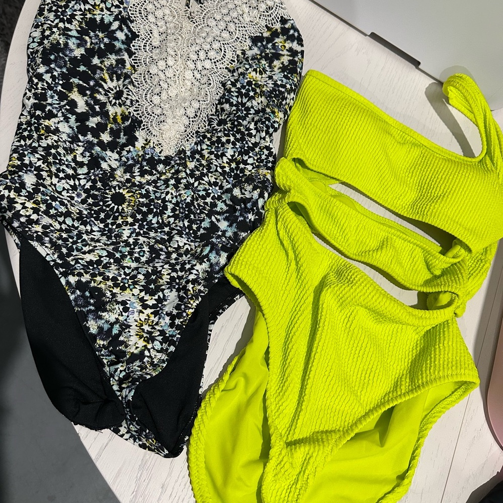 Floral Lace one piece and lime green one piece.